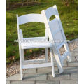 Cadeira dobrável de resina branca para casamento